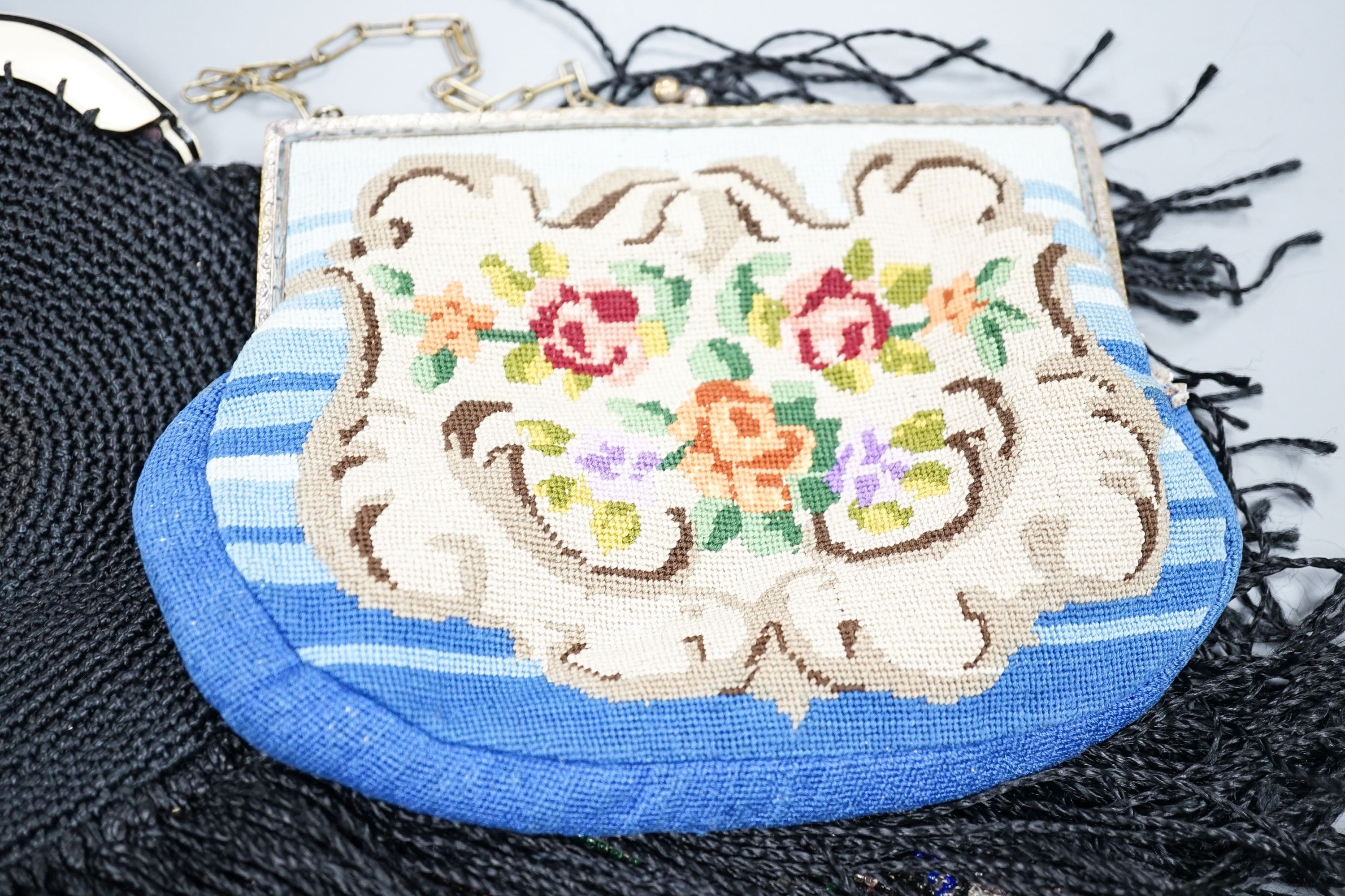 A fine tapestry clutch bag together with a collection of beaded petit point and lurex evening bags (7)